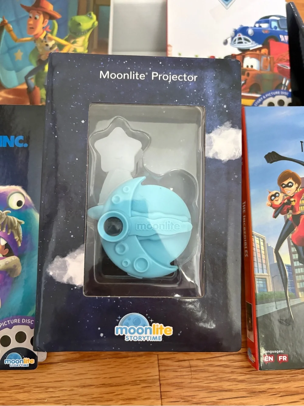 Moonlite Projector with Disney Pixar Story Reels - Blue